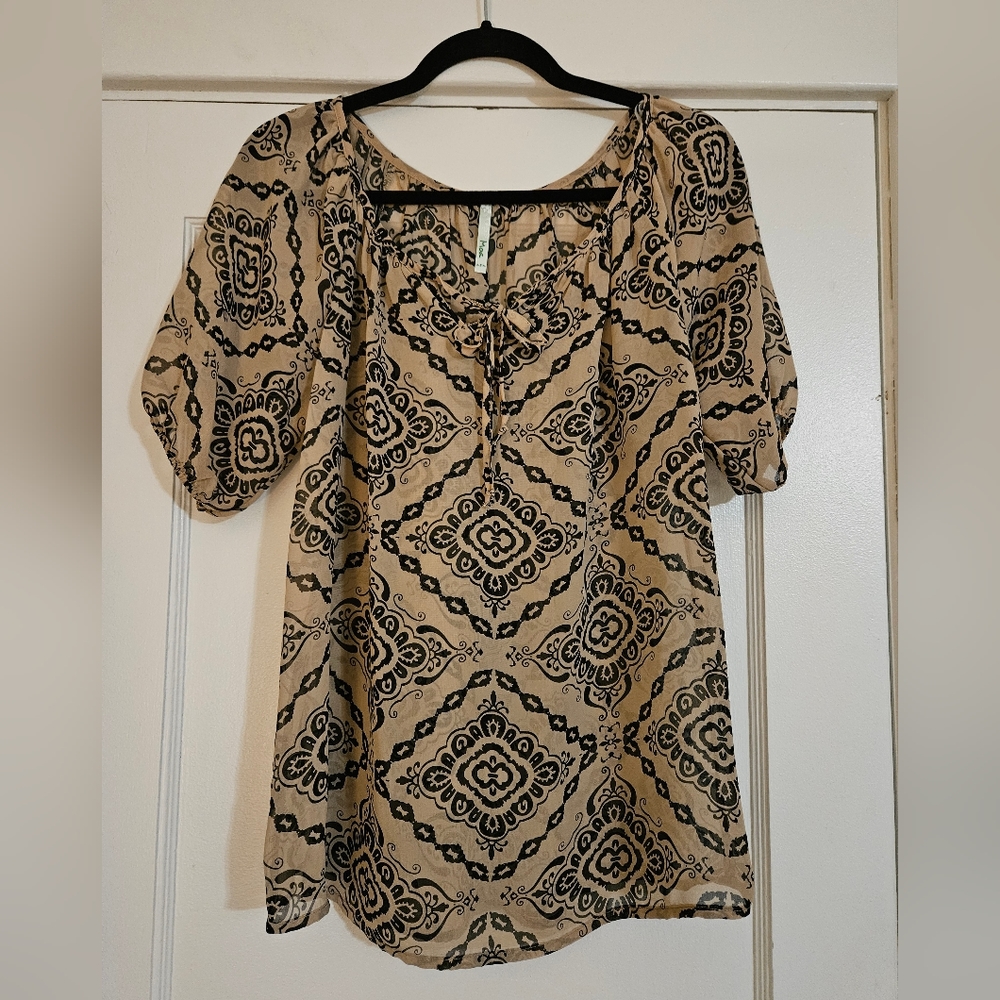 Shear Overlay Blouse with tie front and short balloon sleeves.  No Size.